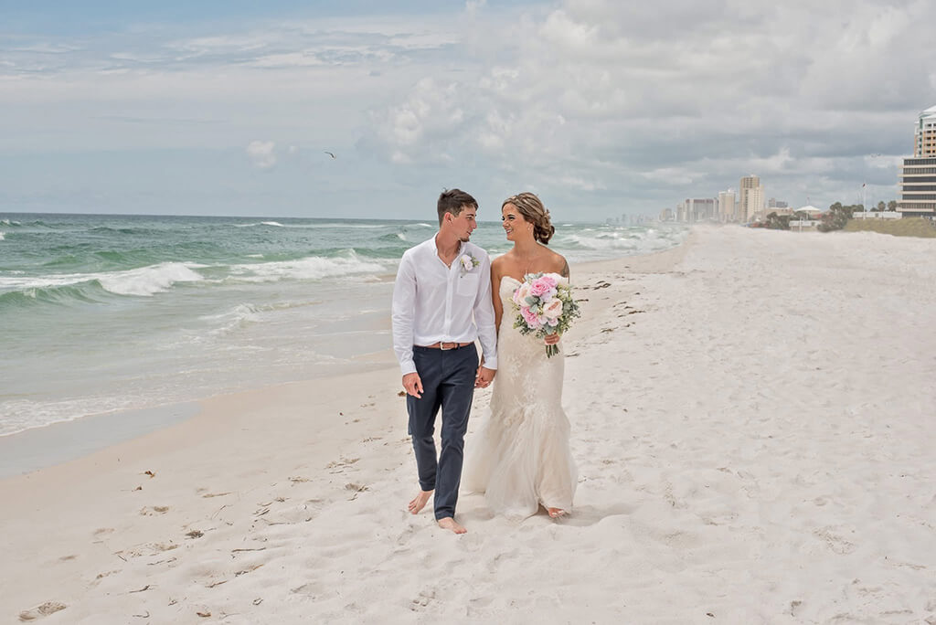 Wedding couple smiling and dancing during a candid moment captured by Tosha Womble