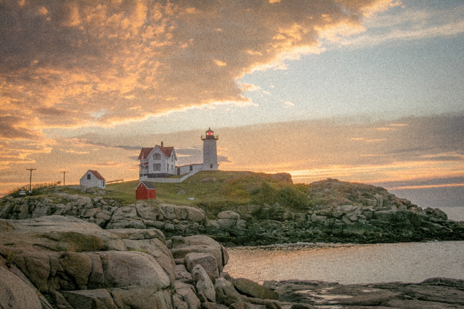 Final vintage-style lighthouse photo edited in Lightroom Mobile with soft tones, film grain, and warm light